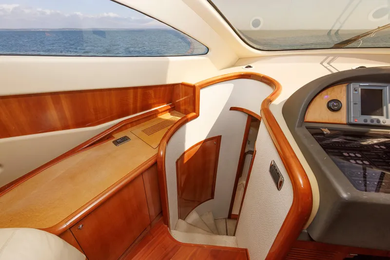 Slide: The Image of Luxurious interior of 2005 Aicon Yachts 56 Flybridge with wood accents and ocean view. - 45