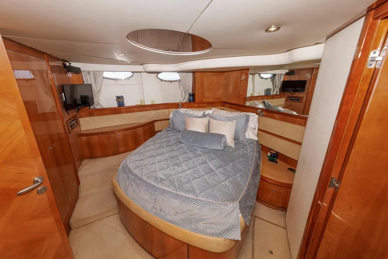 Slide: The Image of Luxurious bedroom interior of 2005 Aicon Yachts 56 Flybridge with elegant wood finish. - 47