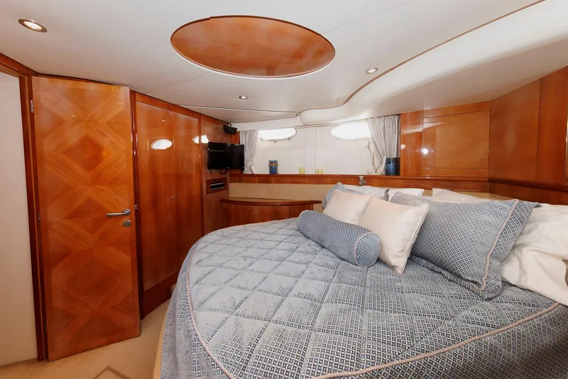 Slide: The Image of Luxurious cabin interior of 2005 Aicon Yachts 56 Flybridge with elegant wood finishes. - 48
