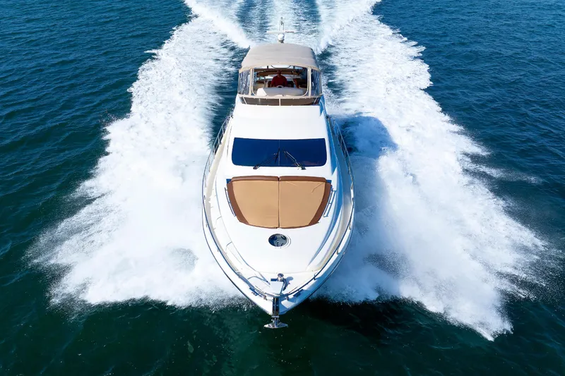 Slide: The Image of Aicon Yachts 56 Flybridge 2005 cruising on open water, aerial view. - 5