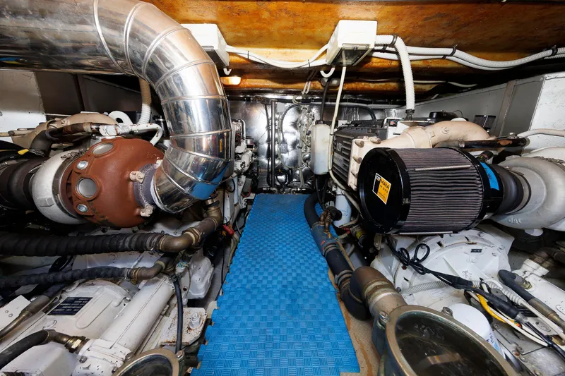 Slide: The Image of Engine room of 2005 Aicon Yachts 56 Flybridge with visible machinery and piping. - 65