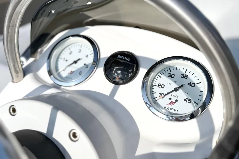 Slide: The Image of Close-up of Walker Bay Genisis 310 2015 boat dashboard with speedometer and compass. - 11