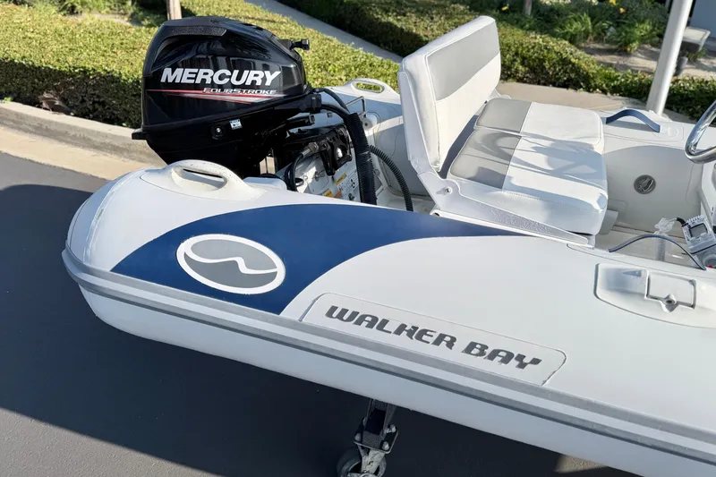 Slide: The Image of Walker Bay Genisis 310 inflatable boat with Mercury FourStroke engine, 2015 model. - 15