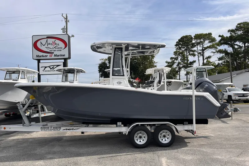 The Image of 2026 Tidewater 220 LXF boat on trailer at Marker 17 Marine dealership. - 0