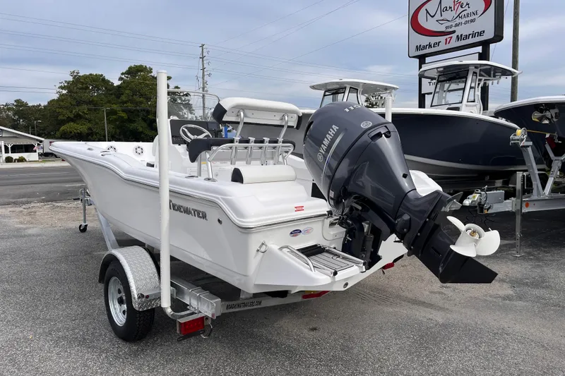 Slide: The Image of 2026 Tidewater 180 CC Adventure boat with Yamaha engine on trailer at dealership. - 2