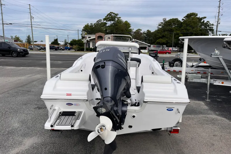Slide: The Image of 2026 Tidewater 180 CC Adventure boat with Yamaha outboard motor, parked on a trailer. - 3