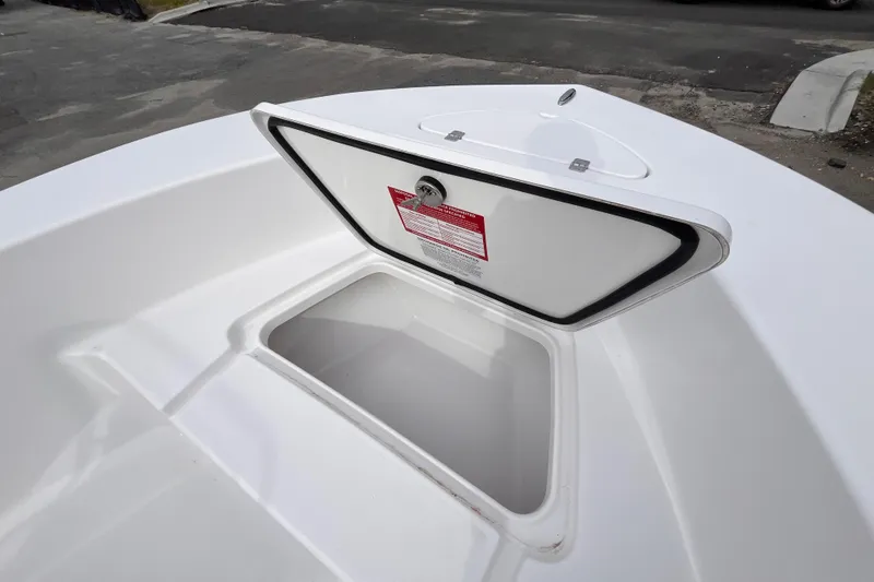 Slide: The Image of Open storage compartment on 2026 Tidewater 180 CC Adventure boat deck. - 9
