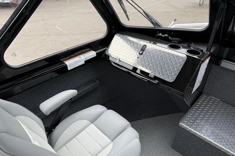 Slide: The Image of Interior of 2026 Thunder Jet 185 Luxor boat with diamond plate accents and seating. - 15