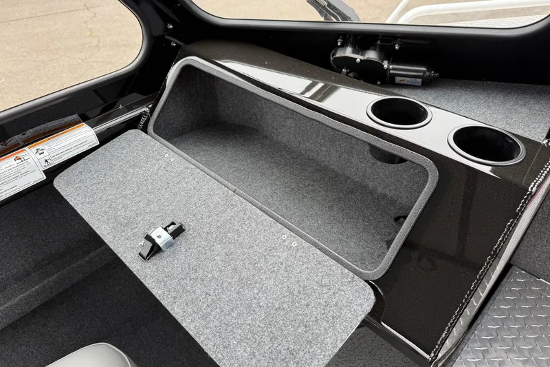 Slide: The Image of Interior of 2026 Thunder Jet 185 Luxor boat with storage compartment and cup holders. - 16