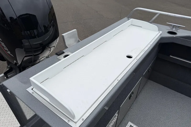 Slide: The Image of 2026 Thunder Jet 185 Luxor boat interior with motor and storage compartment. - 19