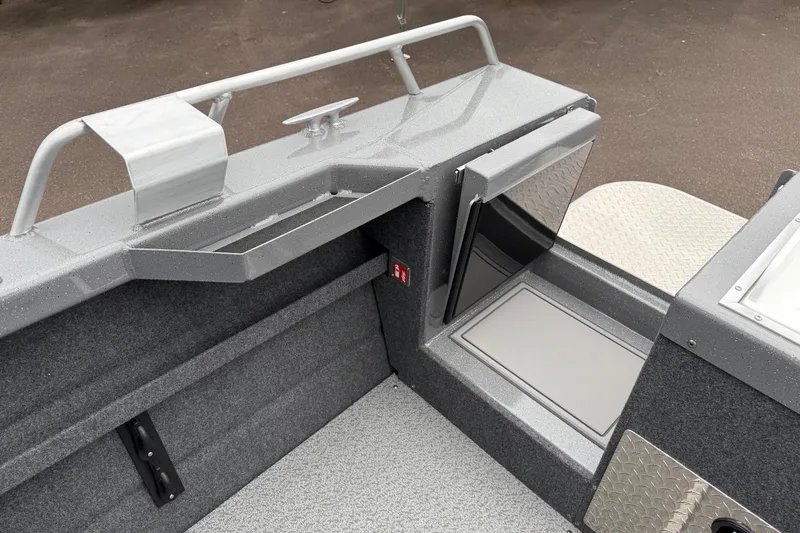 Slide: The Image of 2026 Thunder Jet 185 Luxor boat interior with storage compartment and sleek design. - 23