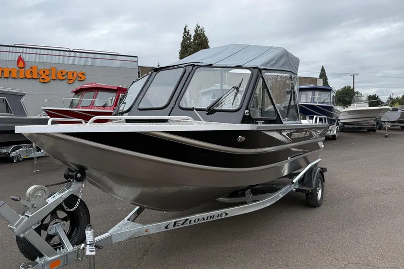 Slide: The Image of 2026 Thunder Jet 185 Luxor boat on trailer at dealership lot. - 5