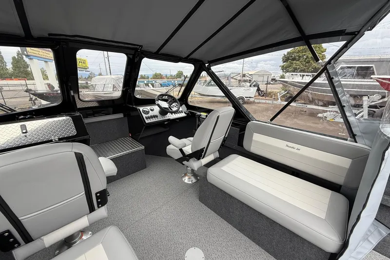 Slide: The Image of Interior of 2026 Thunder Jet 185 Luxor boat with seating and steering console. - 7