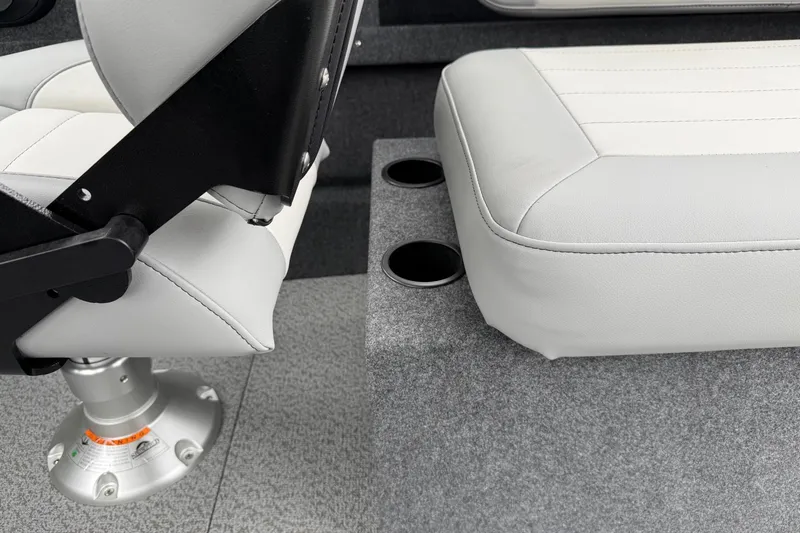 Slide: The Image of 2026 Thunder Jet 185 Luxor interior seating with cup holders, featuring sleek design. - 8