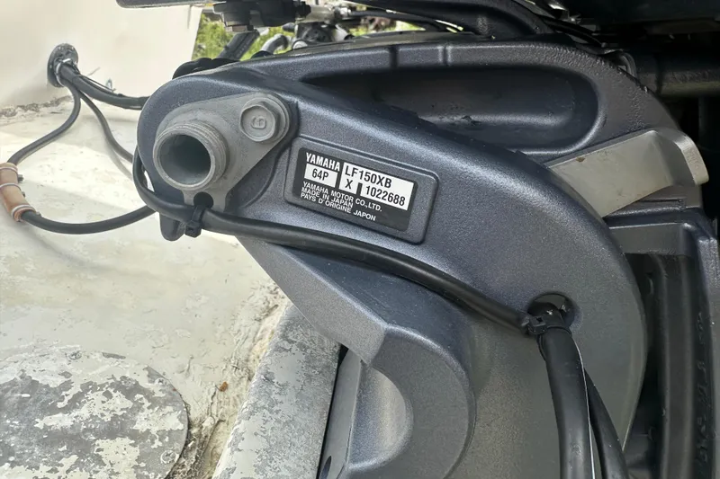 Slide: The Image of Close-up of Yamaha LF150XB engine part on 1987 Grady-White Gulfstream 232 boat. - 10