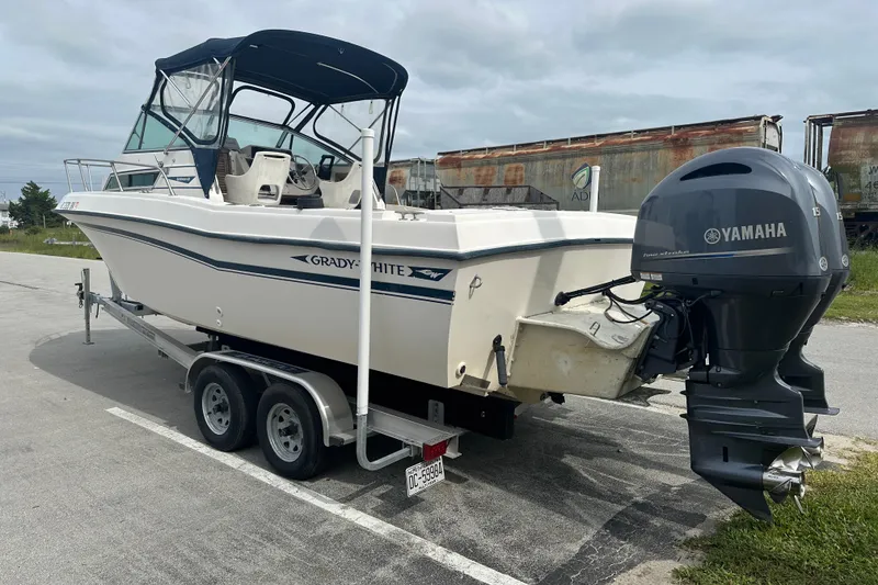 Slide: The Image of 1987 Grady-White Gulfstream 232 boat on trailer with Yamaha outboard motor. - 5