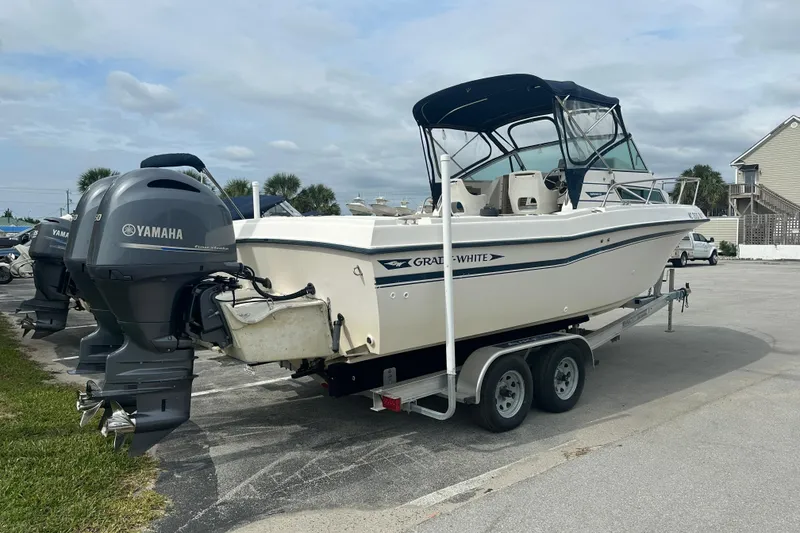 Slide: The Image of 1987 Grady-White Gulfstream 232 boat on trailer with Yamaha outboard motor. - 8
