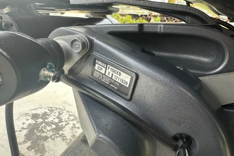 Slide: The Image of Close-up of Yamaha F150XB engine on 1987 Grady-White Gulfstream 232 boat. - 9