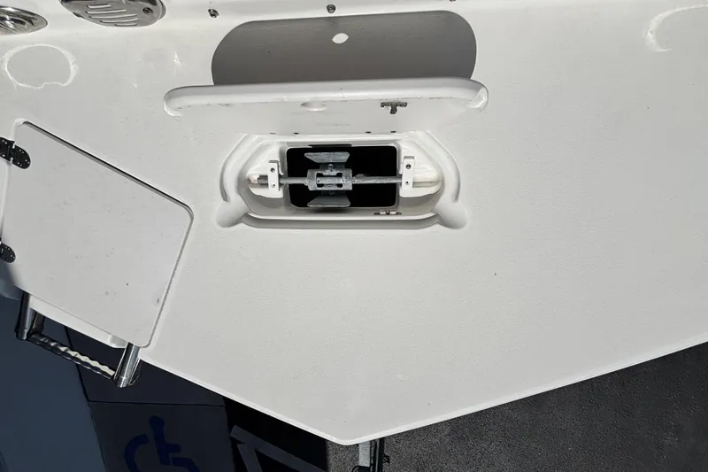 Slide: The Image of 2015 NauticStar 223 DC boat deck with hatch and anchor compartment. - 31