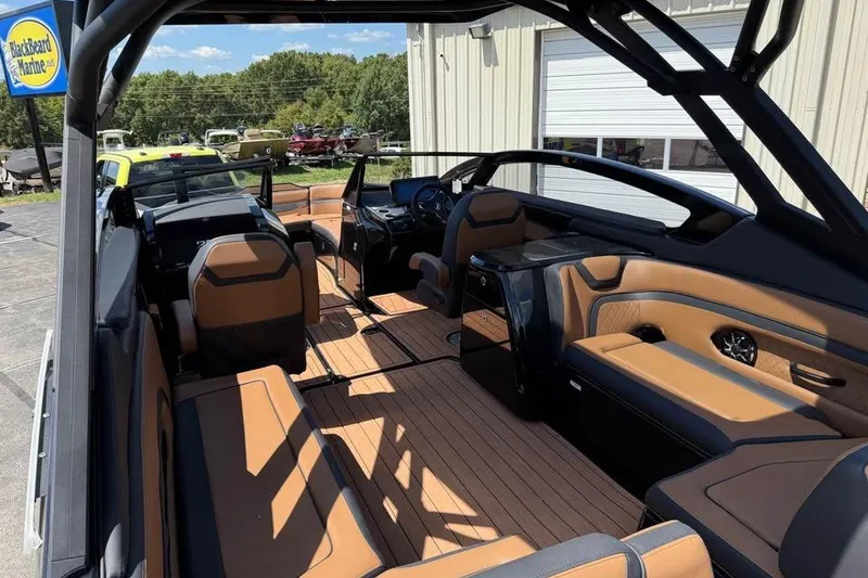 Slide: The Image of 2026 Yamaha Boats 275SD interior with luxurious seating and modern design. - 7