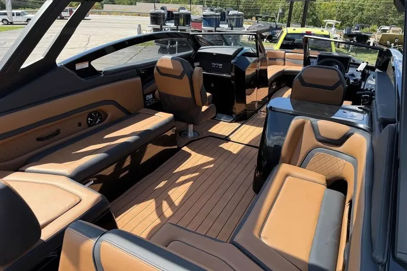 Slide: The Image of 2026 Yamaha Boats 275SD interior with luxurious seating and sleek design. - 8