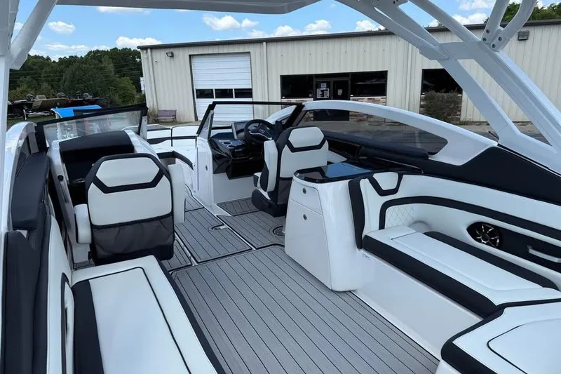 Slide: The Image of 2026 Yamaha Boats 275SD interior with sleek seating and modern design. - 7