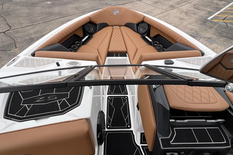 Slide: The Image of 2026 Tigé Z5 boat interior with tan leather seats and modern design. - 16