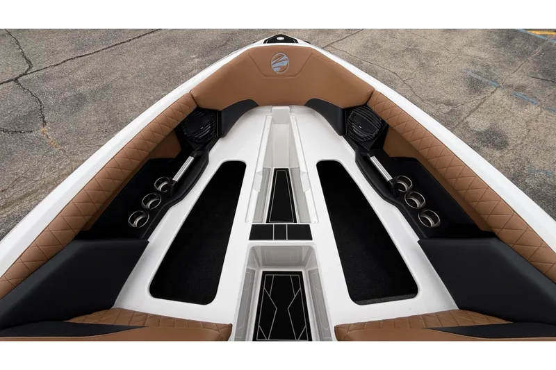 Slide: The Image of Luxurious interior of 2026 Tigé Z5 boat with tan and black seating. - 26