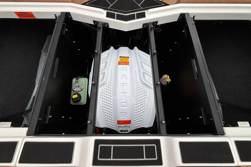 Slide: The Image of 2026 Tigé Z5 boat engine compartment with Raptor 400 engine visible. - 36
