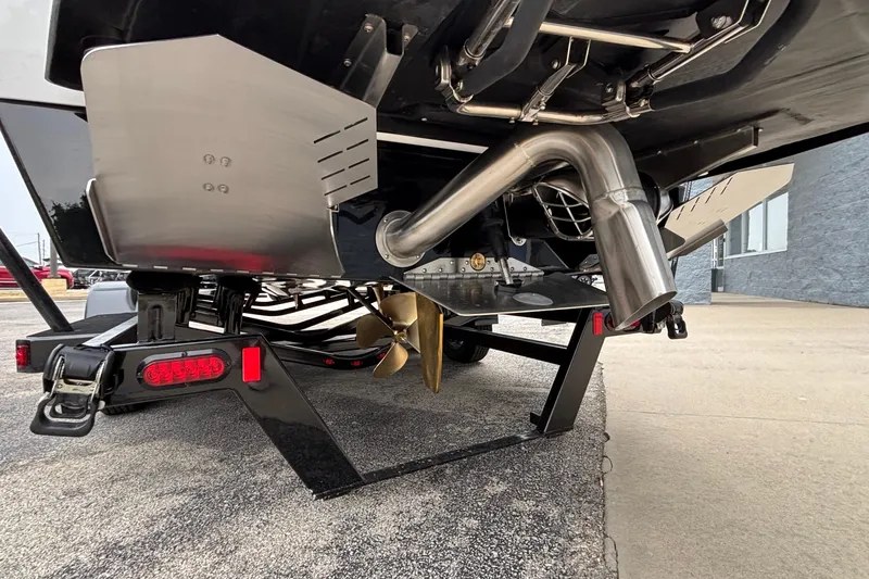 Slide: The Image of 2026 Tigé Z5 boat underside showing propeller and exhaust system. - 40