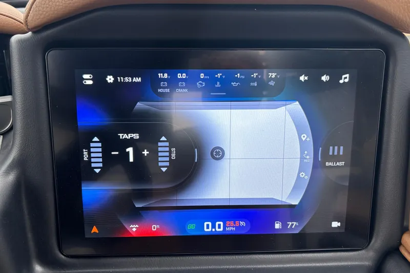 Slide: The Image of Touchscreen display of 2026 Tigé Z5 boat showing control settings and navigation data. - 6