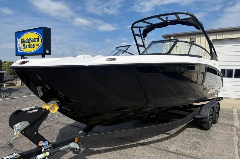 Slide: The Image of 2026 Yamaha Boats AR250 on trailer at BlackBeard Marine dealership. - 1