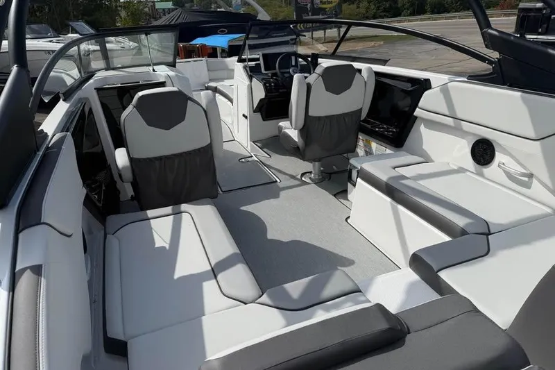 Slide: The Image of 2026 Yamaha Boats AR250 interior with modern seating and sleek design. - 6