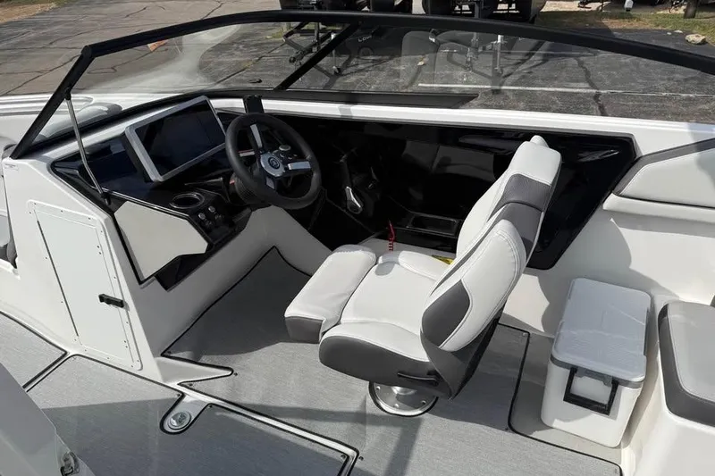 Slide: The Image of 2026 Yamaha Boats AR250 cockpit with modern steering and seating design. - 8