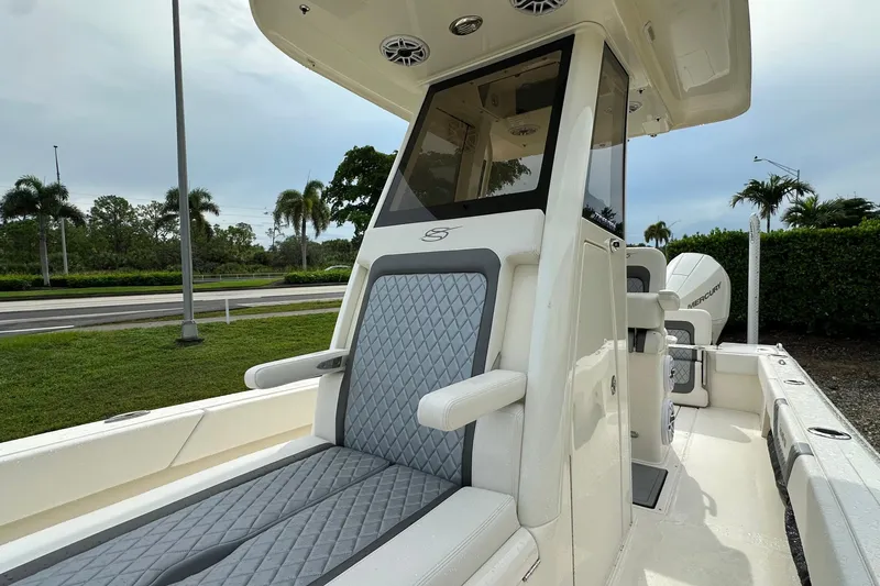 Slide: The Image of 2026 ShearWater 270 SS Open boat interior with sleek seating and modern design. - 14