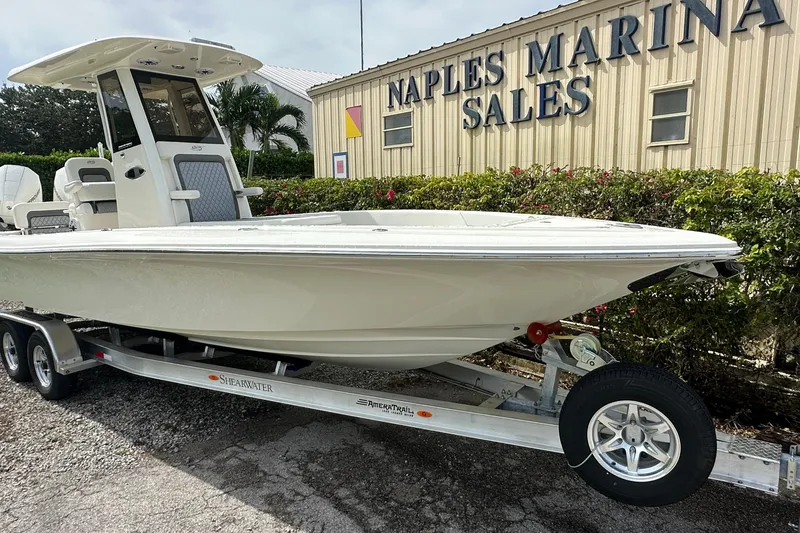 Slide: The Image of 2026 ShearWater 270 SS Open boat on trailer at Naples Marina Sales. - 25