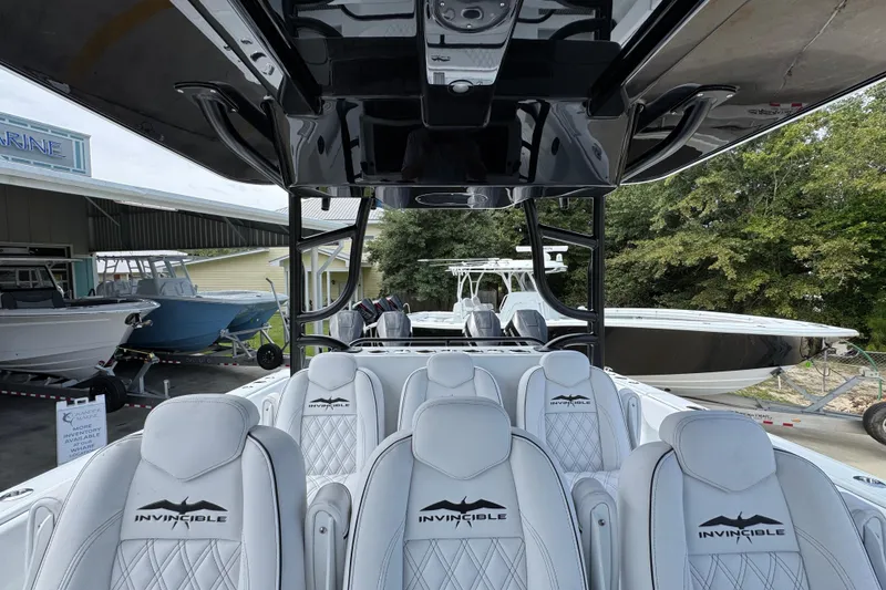 Slide: The Image of 2026 Invincible 40 Catamaran interior with luxurious seating and sleek design. - 31
