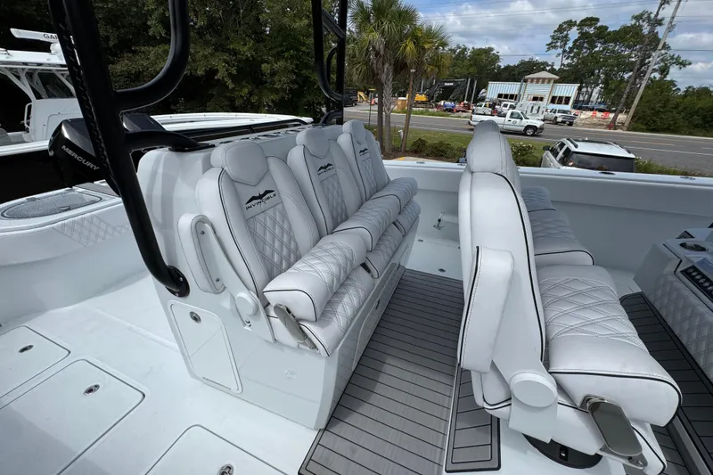Slide: The Image of Luxurious seating on 2026 Invincible 40 Catamaran, featuring elegant white upholstery and modern design. - 36