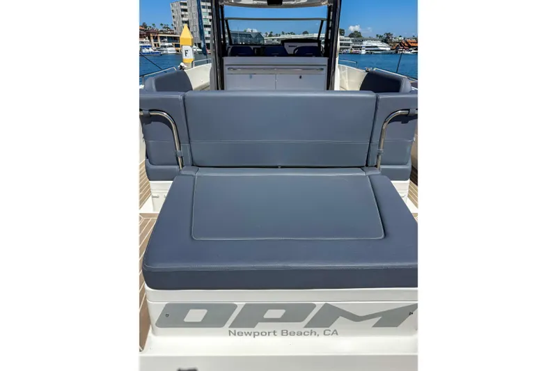 Slide: The Image of 2023 Nimbus Tender 11 boat interior with blue seating, Newport Beach, CA. - 8