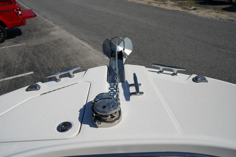Slide: The Image of Bow of 2014 Edgewater 245CC boat with anchor and cleats. - 48