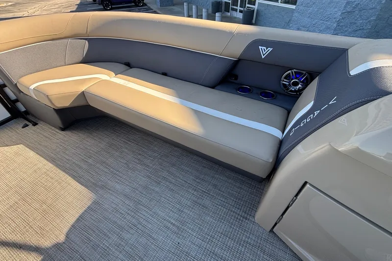Slide: The Image of Luxurious seating on 2026 Viaggio Z24U boat with integrated speakers and cup holders. - 12