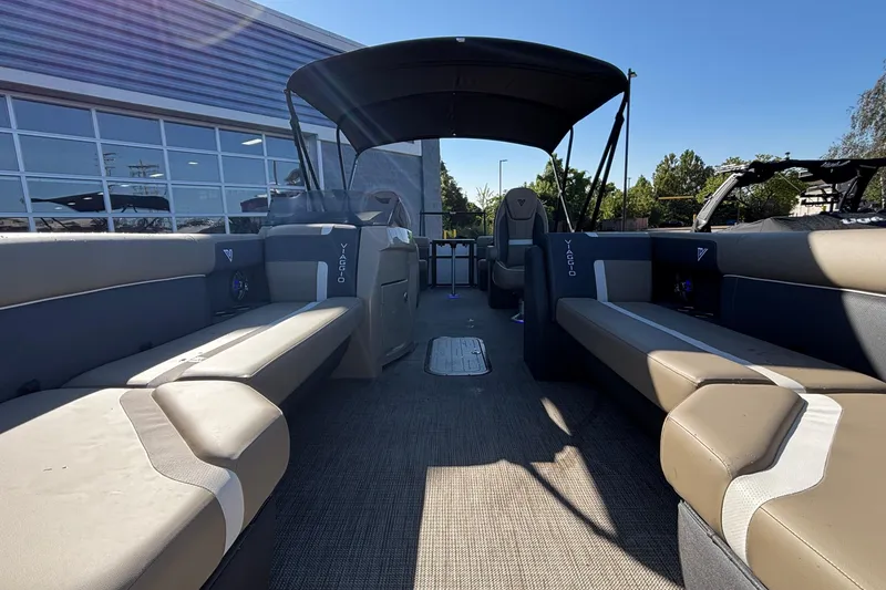 Slide: The Image of 2026 Viaggio Z24U pontoon boat interior with spacious seating and canopy. - 14