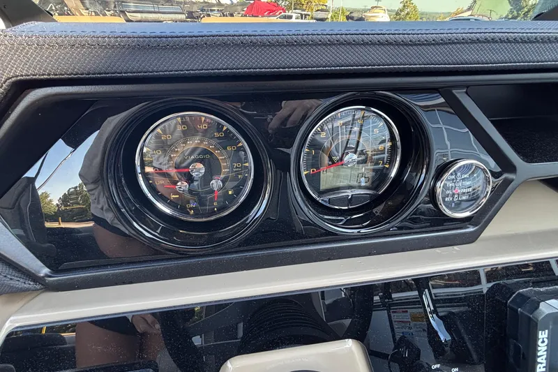 Slide: The Image of Dashboard of 2026 Viaggio Z24U with speedometer and gauges in focus. - 15