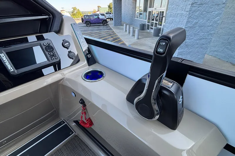 Slide: The Image of Control panel of 2026 Viaggio Z24U boat with navigation system and throttle lever. - 16