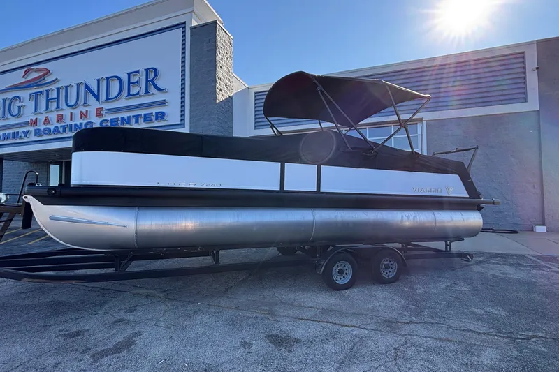 Slide: The Image of 2026 Viaggio Z24U pontoon boat at Big Thunder Marine dealership. - 2