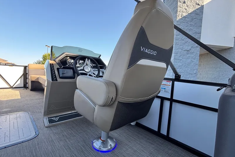 Slide: The Image of Viaggio Z24U 2026 boat interior with steering wheel and captain's chair. - 22