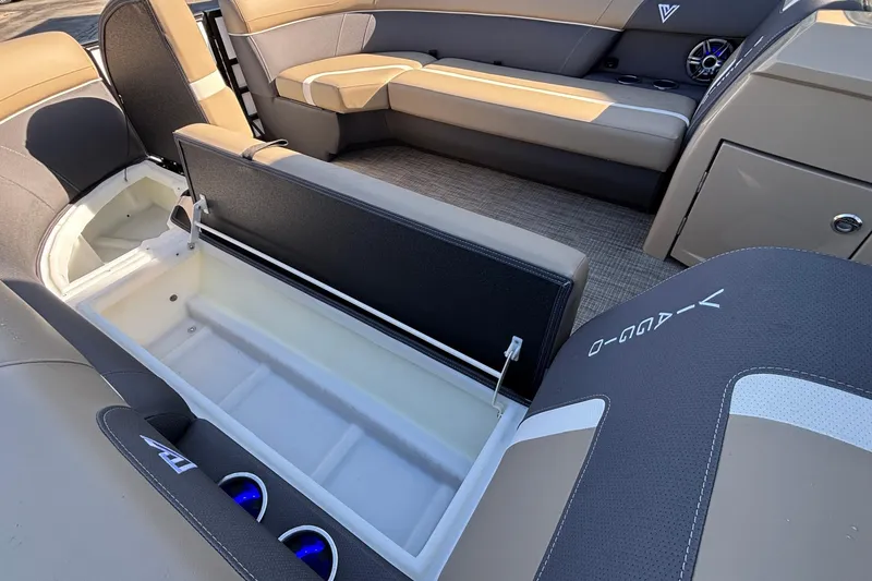 Slide: The Image of Interior of 2026 Viaggio Z24U boat with open storage compartment and seating. - 25
