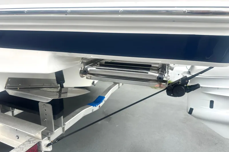 Slide: The Image of 2025 Regal 26 XO boat stern with ladder and trim tab details. - 20