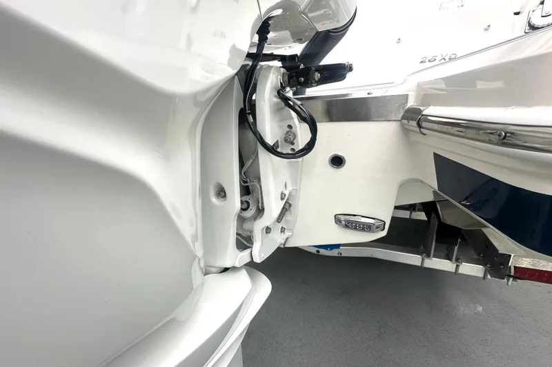 Slide: The Image of 2025 Regal 26 XO boat stern detail with trailer attachment. - 23