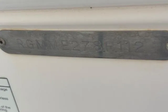 Slide: The Image of Hull identification number on a 2012 Regal 2500 Bowrider boat. - 21